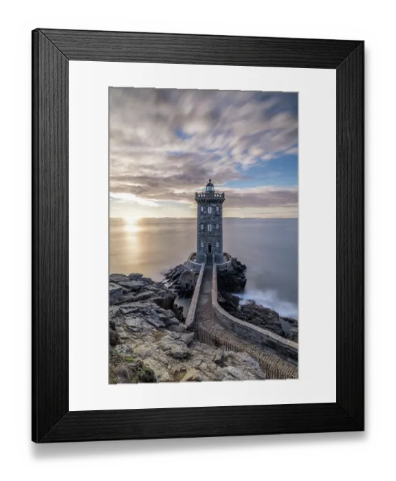 Framed Print : France, Brittany, Le Conquet. Sun setting at the Kermorvan Lighthouse