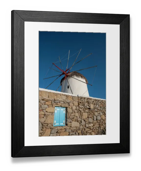 Framed Print : A traditional windmill set behind a rock masonry wall. Chora, Mykonos Island, Cyclades Islands, Greece Framed Print : A traditional windmill set behind a rock masonry wall. Chora, Mykonos Island, Cyclades Islands, Greece