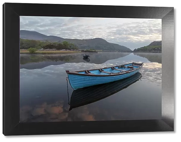 Ireland, Lough Leane. Boat and reflections on lake