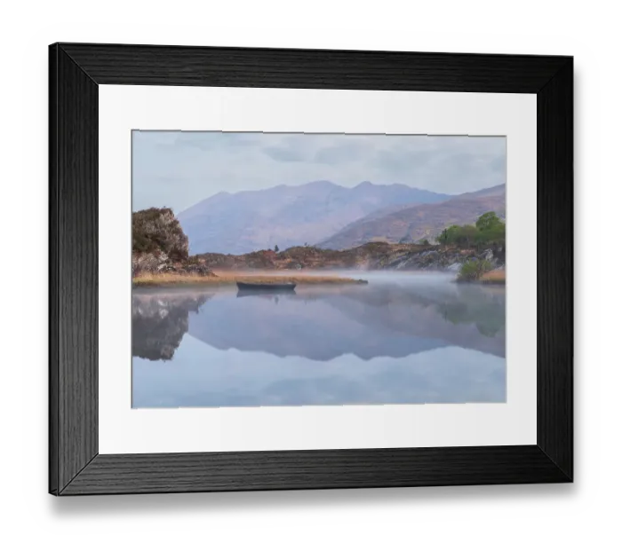 Framed Print : Ireland, Lough Leane. Boat and reflections on lake Framed Print : Ireland, Lough Leane. Boat and reflections on lake
