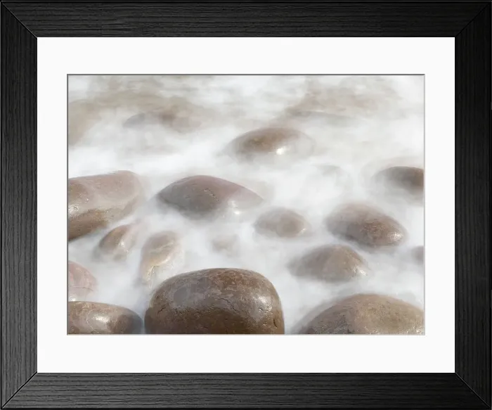 Framed Print : Ireland, Kinard. Close-up of wave on smooth beach rocks