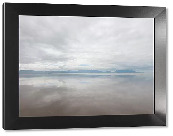 Ireland, Inch Strand. Landscape with fog on ocean and beach