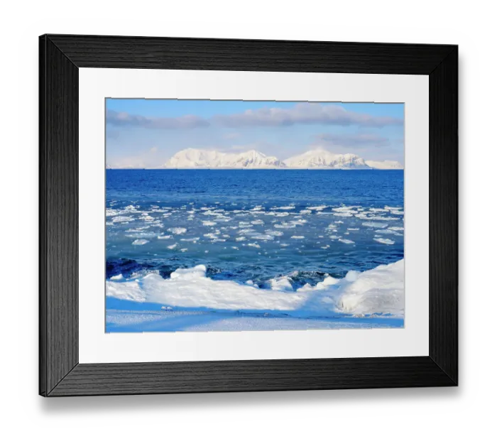 Framed Print : Coast with pancake ice near Kapp Linne at fjord Isfjorden near Isfjorden Radio, Island of Spitsbergen. Background mountains of Nordre Isfjorden National Park. Arctic region, Scandinavia, Norway, Svalbard Framed Print : Coast with pancake ice near Kapp Linne at fjord Isfjorden near Isfjorden Radio, Island of Spitsbergen. Background mountains of Nordre Isfjorden National Park. Arctic region, Scandinavia, Norway, Svalbard