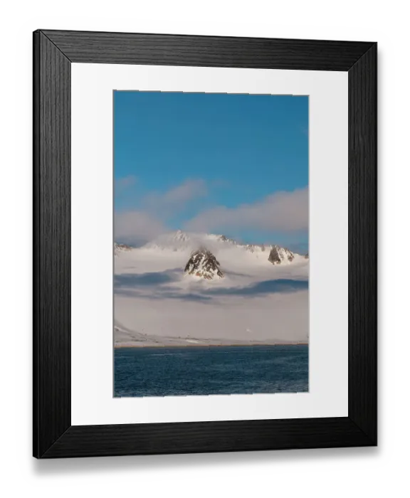 Framed Print : A scenic view of the ice covered mountains surrounding Magdalenefjorden, Spitsbergen Island, Svalbard, Norway
