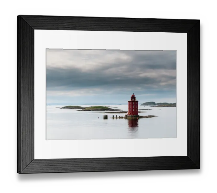 Framed Print : The 1880 Kjeungskjaer lighthouse sits on a small island in the glacial waters of Bjugnfjorden. Bjugnfjorden, Norway Framed Print : The 1880 Kjeungskjaer lighthouse sits on a small island in the glacial waters of Bjugnfjorden. Bjugnfjorden, Norway