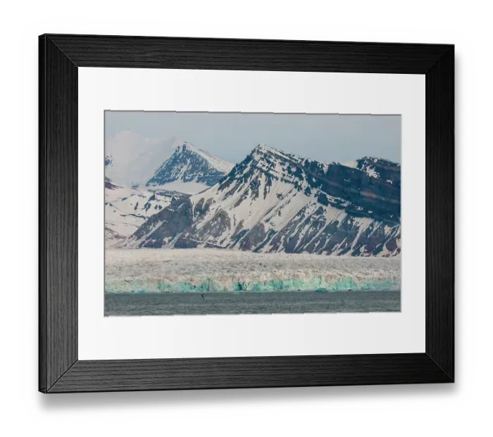 Framed Print : Ice capped mountains and a glacier border Kongsfjorden near Ny-Alesund, Kongsfjorden, Spitsbergen Island, Svalbard, Norway