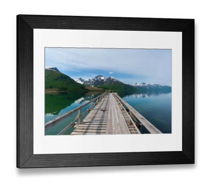 Framed Print : A pier on Holandsfjorden, rimmed with ice streaked mountains, near Svartisen. Saltfjellet-Svartisen National Park, Svartisen, Norway Framed Print : A pier on Holandsfjorden, rimmed with ice streaked mountains, near Svartisen. Saltfjellet-Svartisen National Park, Svartisen, Norway