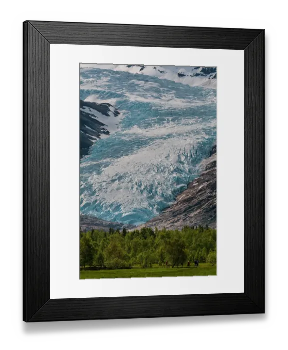 Framed Print : Hikers walk in a verdant valley near the terminus of Svartisen Glacier. Saltfjellet-Svartisen National Park, Svartisen, Norway