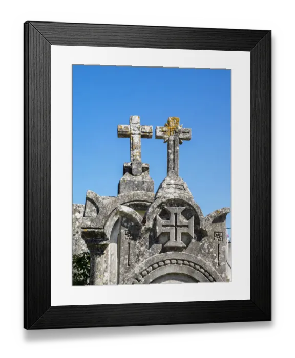 Framed Print : Cross at the top of an ancient gravestone in the cemetery at the Castelo de Ourem, a Portuguese National Monument