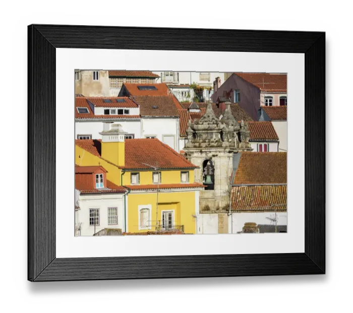 Framed Print : Rooftops of the town of Coimbra and the old bell tower of St. Bartholomew church