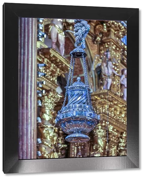Spain, Galicia. Botafumeiro in the cathedral. One of the largest censers (incense) that weighs 80 kg and is 1.6 meters tall. Eight men use ropes to swing it and it can reach heights of 21 meters and swings at a speed of 68 kmh