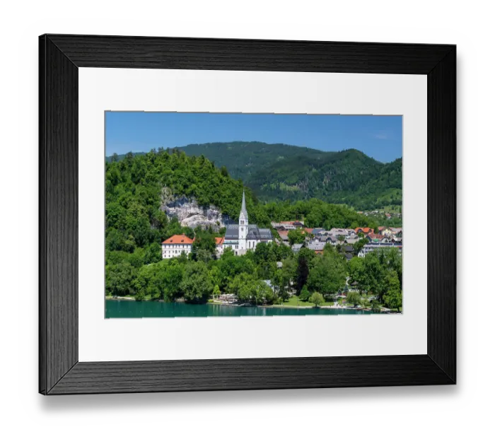 Framed Print : A view of the town of Bled and Saint Martin's church. Bled, Slovenia