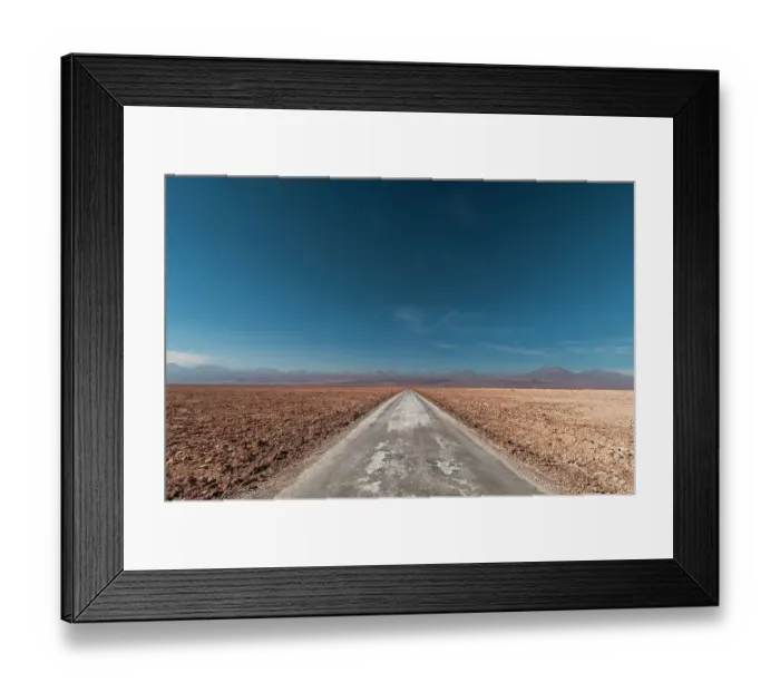 Framed Print : An empty road through a salt flat in the Salar de Atacama. Salar de Atacama, Atacama Desert, Antofagasta Region, Chile