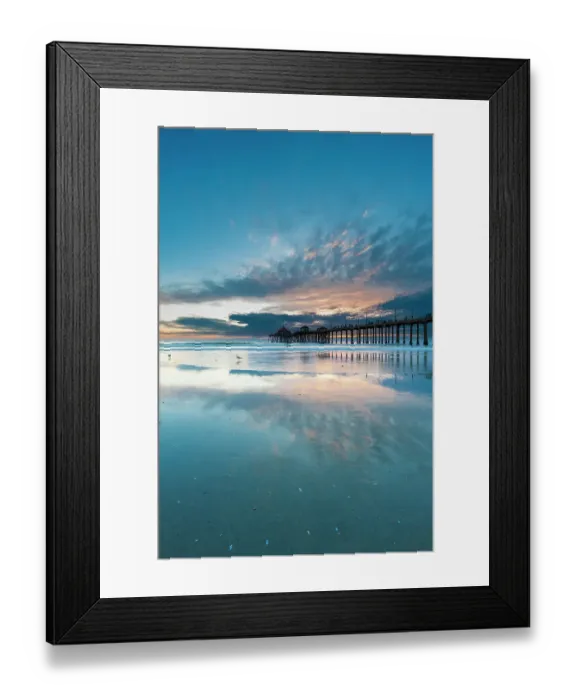 Framed Print : The Huntington Beach Pier and reflections on the wet beach at sunset. Huntington Beach, California