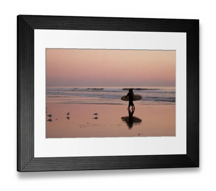 Framed Print : Surfers cast a shadow on wet sand as they walk on Huntington Beach at sunset. California, USA Framed Print : Surfers cast a shadow on wet sand as they walk on Huntington Beach at sunset. California, USA