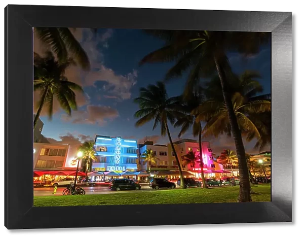 The Colony Hotel and Ocean Drive at dusk. South Beach, Miami Beach, Florida