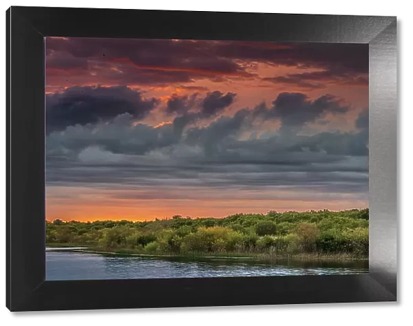 USA, New Jersey, Cape May National Seashore. Panoramic with lake and clouds lit at sunrise