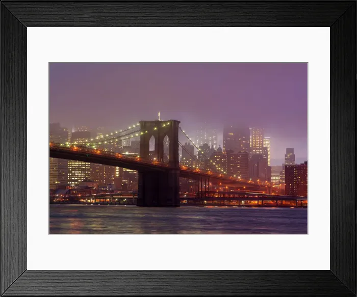 Framed Print : Manhattan skyline and the Brooklyn bridge in the mist at dusk Framed Print : Manhattan skyline and the Brooklyn bridge in the mist at dusk