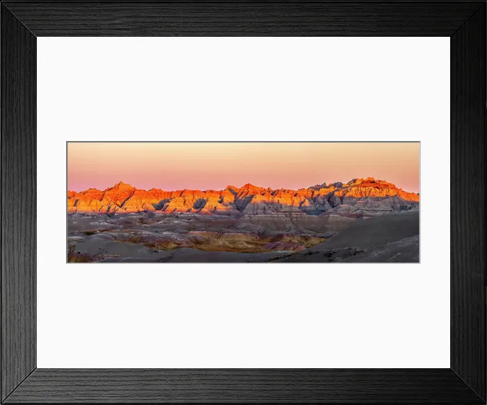 Framed Print : USA, South Dakota, Badlands National Park. Panoramic of sunrise on arid park formations