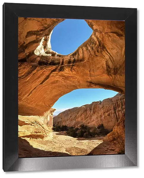 Wild Horse Window, a natural arch inside a sandstone alcove. San Rafael Reef, Utah
