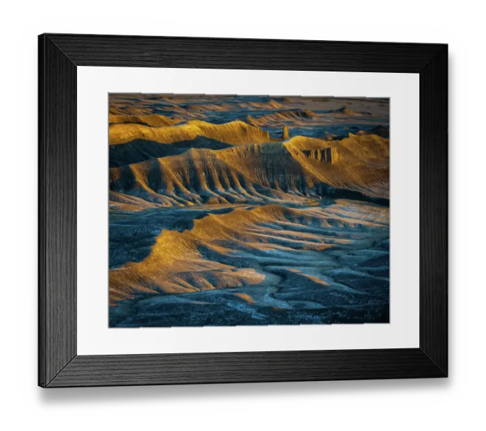 Framed Print : USA, Utah, Capital Reef National Park. Sunrise on mountain badlands