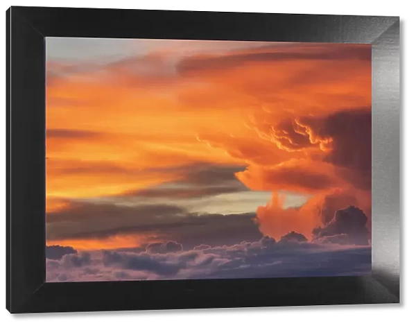 USA, Utah. Sunset lights up thunderhead cloud