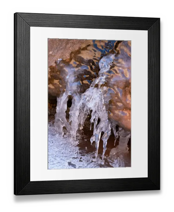 Framed Print : USA, Utah. Ice formations with sky and canyon wall reflections, Arches National Park