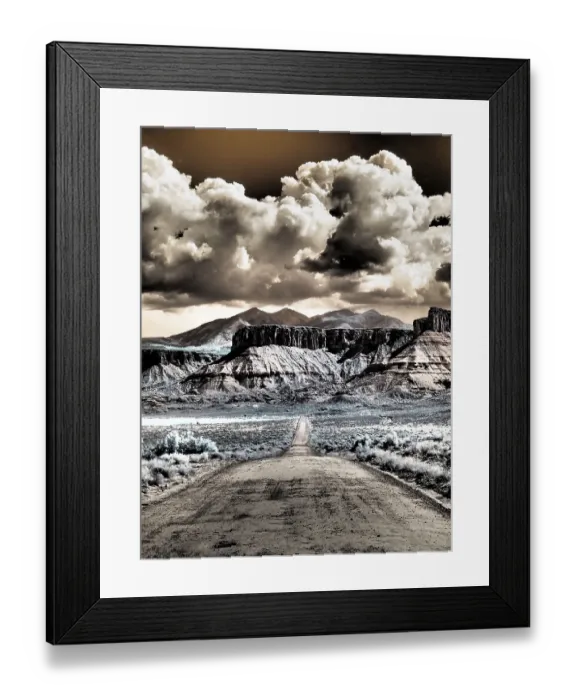 Framed Print : USA, Utah. Infrared of road leading to Fisher Tower and large clouds Framed Print : USA, Utah. Infrared of road leading to Fisher Tower and large clouds