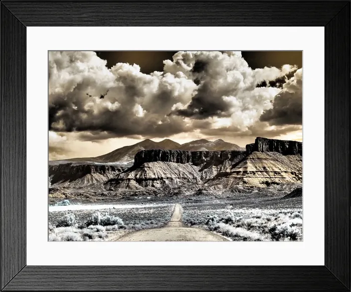Framed Print : USA, Utah. Infrared of road leading to Fisher Tower and large clouds Framed Print : USA, Utah. Infrared of road leading to Fisher Tower and large clouds