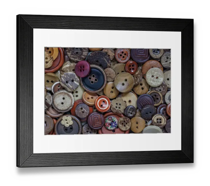 Framed Print : Close-up of variety of buttons