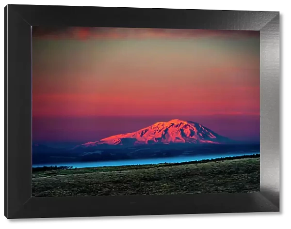 USA, Washington State, Zillah. Dawn light on Mt. Adams seen from Yakima Valley wine country in winter