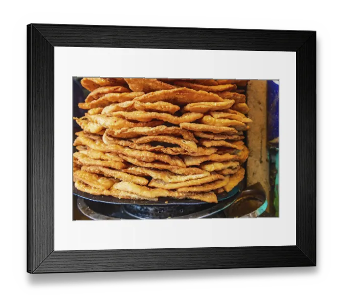 Framed Print : Nowhatta, Srinagar, Jammu and Kashmir, India. Fried snack food at a market in Srinagar