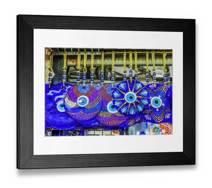 Framed Print : Colorful blue evil eye charms, Grand Bazaar, Istanbul, Turkey. Evil Eye Charm protects family against evil energy and spirits. Originally from Ancient Greece and Rome, but has origins in many religions and cultures