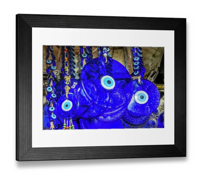 Framed Print : Colorful blue evil eye charms, Grand Bazaar, Istanbul, Turkey. Evil Eye Charm protects family against evil energy and spirits. Originally from Ancient Greece and Rome, but has origins in many religions and cultures