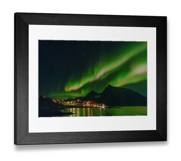 Framed Print : Northern Lights over settlement Kuummiit (formerly spelled Kummiut). Ammassalik area in East Greenland, Danish Territory