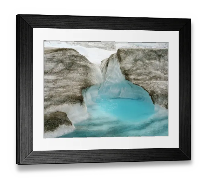 Framed Print : Drainage system on the surface of the ice sheet. The brown sediment on the ice is created by the rapid melting of the ice. Landscape of Greenland near Kangerlussuaq, Kingdom of Denmark