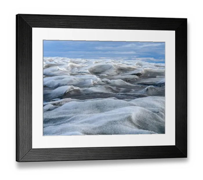 Framed Print : The brown sediment on the Greenland ice is created by the rapid melting of the ice. Landscape of Greenland near Kangerlussuaq, Kingdom of Denmark