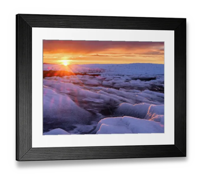 Framed Print : Midnight sun on the ice sheet. The brown sediment on the ice is created by the rapid melting of the ice. Landscape of Greenland near Kangerlussuaq, Kingdom of Denmark Framed Print : Midnight sun on the ice sheet. The brown sediment on the ice is created by the rapid melting of the ice. Landscape of Greenland near Kangerlussuaq, Kingdom of Denmark