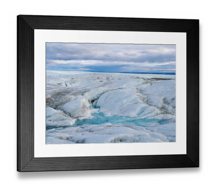 Framed Print : View towards terminal moraine and foreland of the ice sheet. The brown sediment on the ice is created by the rapid melting of the ice. Landscape of Greenland near Kangerlussuaq, Kingdom of Denmark