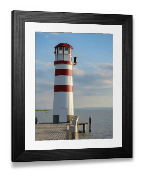 Framed Print : Village Podersdorf and the shore of Lake Neusiedl. The lighthouse at the harbor, the landmark of Podersdorf. Part of the UNESCO World Heritage Site. Austria, Burgenland Framed Print : Village Podersdorf and the shore of Lake Neusiedl. The lighthouse at the harbor, the landmark of Podersdorf. Part of the UNESCO World Heritage Site. Austria, Burgenland