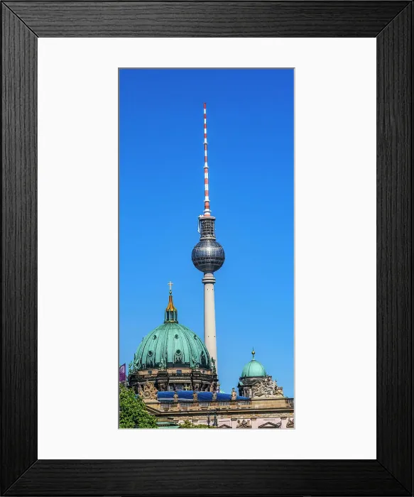 Framed Print : TV tower Fernsehturm and Berlin Cathedral, Berlin, Germany. Tower constructed in 1960's by East German communist government. Cathedral is largest Protestant church in Germany Framed Print : TV tower Fernsehturm and Berlin Cathedral, Berlin, Germany. Tower constructed in 1960's by East German communist government. Cathedral is largest Protestant church in Germany