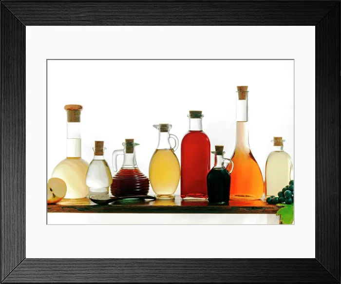 Framed Print : Different types of vinegar (from left, apple, rice, Brunello wine, white grape, red grape, balsamic, beer, honey) Framed Print : Different types of vinegar (from left, apple, rice, Brunello wine, white grape, red grape, balsamic, beer, honey)