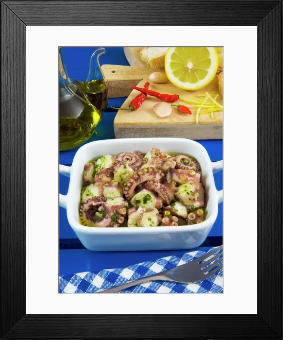 Framed Print : Octopus salad (made with boiled octopus, olive oil, lemon, garlic, chili, parsley, pepper, salt) Framed Print : Octopus salad (made with boiled octopus, olive oil, lemon, garlic, chili, parsley, pepper, salt)