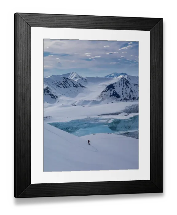 Framed Print : Svalbard, Norway. Guide and skier enjoys a pristine slope Framed Print : Svalbard, Norway. Guide and skier enjoys a pristine slope