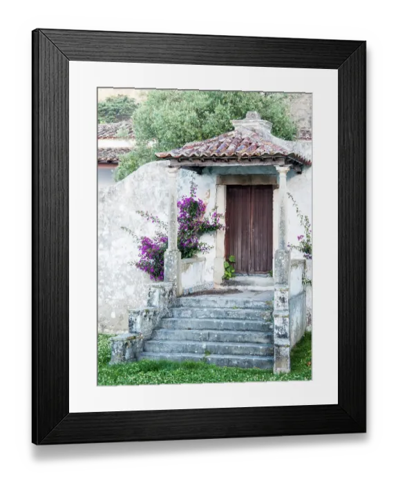 Framed Print : Portugal, Obidos. Dark purple bougainvillea vine growing along side the entrance of a home in the walled town Framed Print : Portugal, Obidos. Dark purple bougainvillea vine growing along side the entrance of a home in the walled town