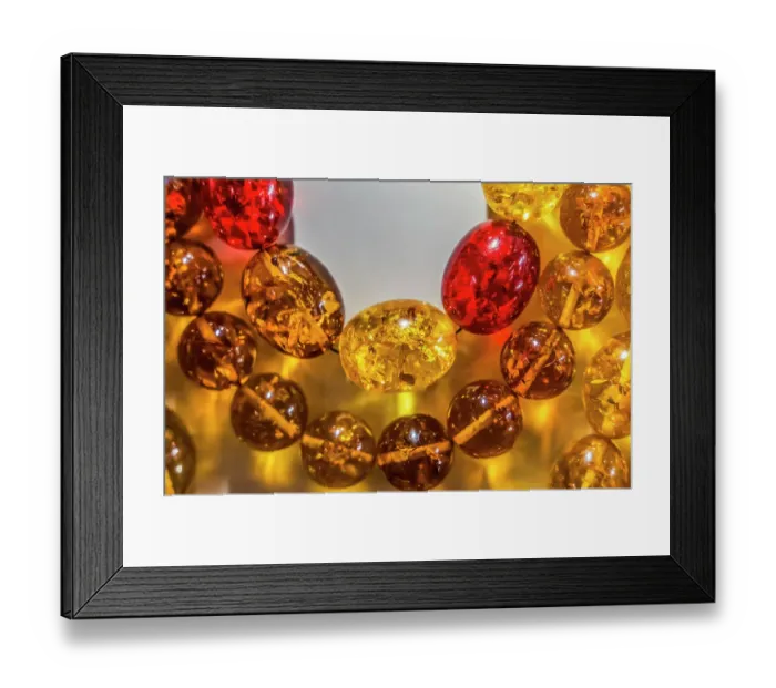 Framed Print : Colorful golden Baltic amber, Gdansk, Poland. Amber capital of the world. Amber 40 million years old. Found Gdansk Beaches 6000 years. Plant pollen in amber Framed Print : Colorful golden Baltic amber, Gdansk, Poland. Amber capital of the world. Amber 40 million years old. Found Gdansk Beaches 6000 years. Plant pollen in amber