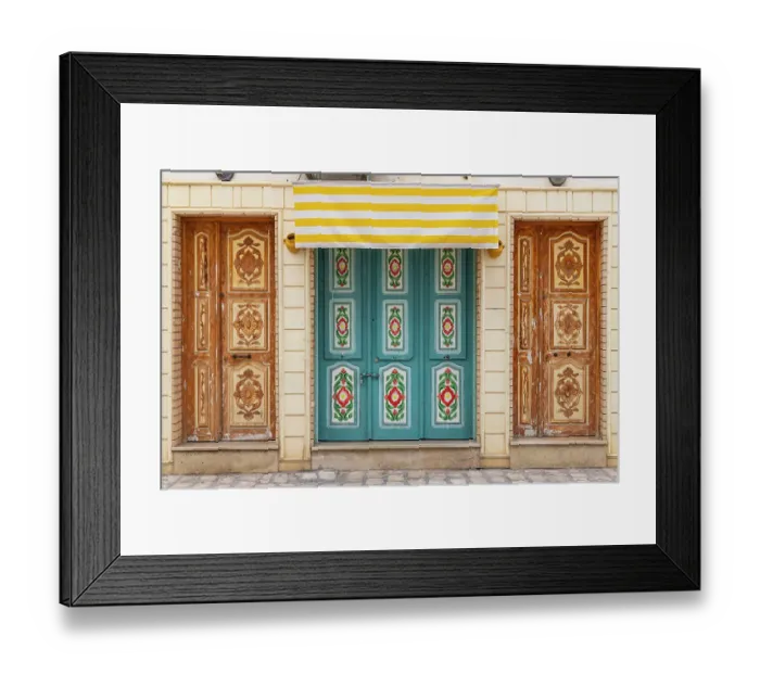 Framed Print : Kairouan, Tunisia. A colorful door on a building in the city of Kairouan Framed Print : Kairouan, Tunisia. A colorful door on a building in the city of Kairouan