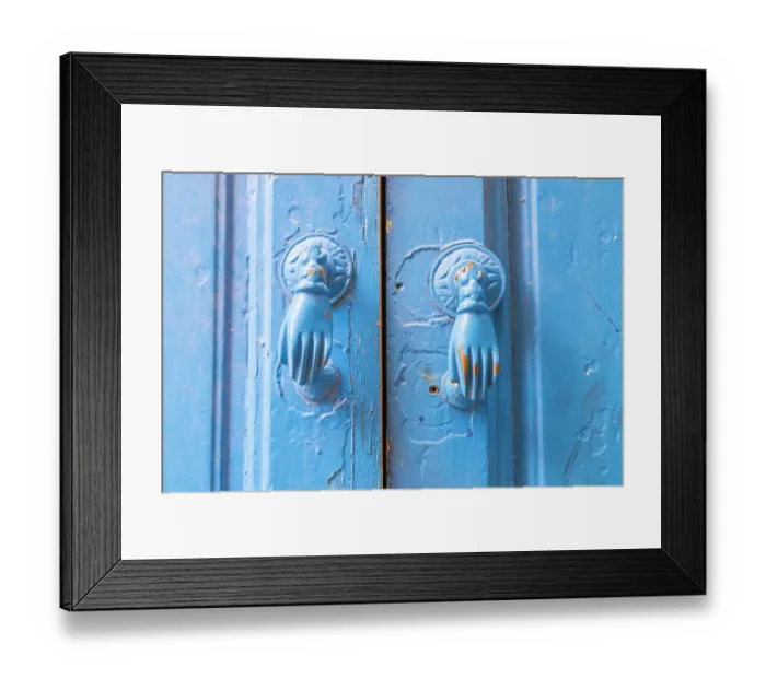 Framed Print : Hammamet, Nabeul, Tunisia. Hand shaped door knockers on a blue painted door Framed Print : Hammamet, Nabeul, Tunisia. Hand shaped door knockers on a blue painted door