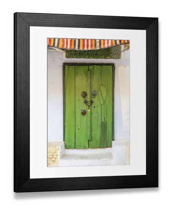 Framed Print : Kairouan, Tunisia. A green door on a building in the city of Kairouan Framed Print : Kairouan, Tunisia. A green door on a building in the city of Kairouan