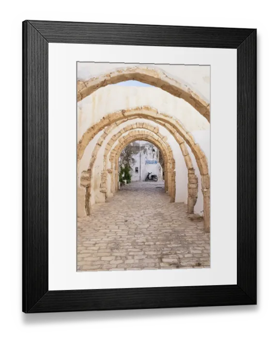 Framed Print : Djerba, Medenine, Tunisia. Arched passageway in the Houmt Souk Framed Print : Djerba, Medenine, Tunisia. Arched passageway in the Houmt Souk